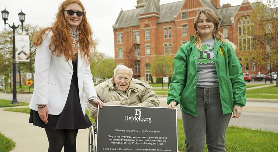 Mackenzie Haneberg and Jocelyn Everett with Dr. Percy Lilly