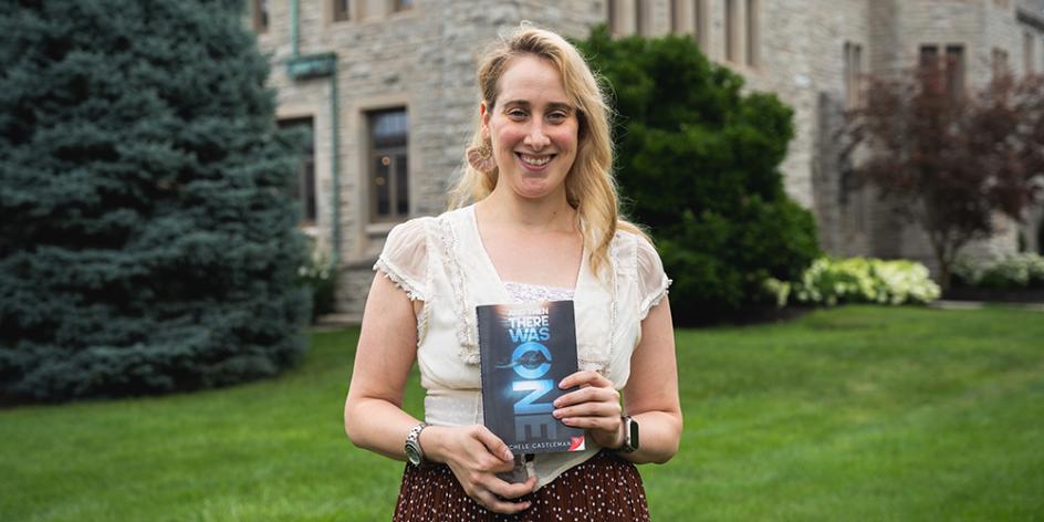 Dr. Michele Castleman Holding Her Book