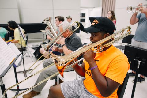 Marques playing the tuba