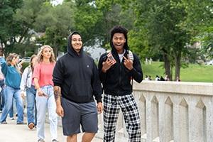 Students walking across T-Bridge